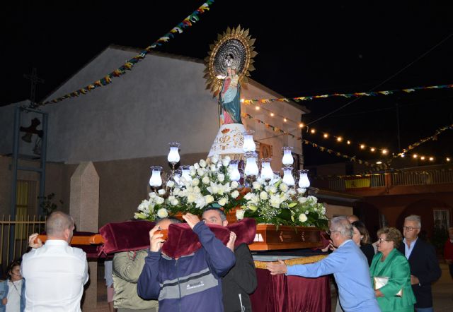 La procesión de la Virgen del Pilar dio por concluidas las fiestas del barrio de la Florida